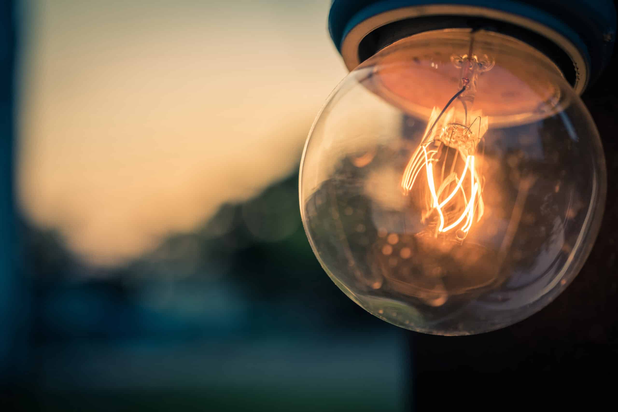 Glowing antique filament light bulb